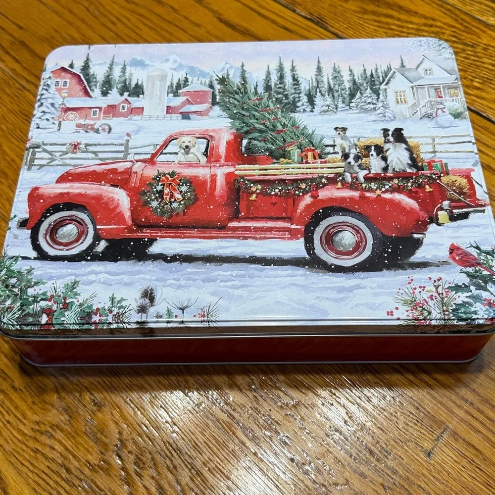 Christmas Scene 300 piece puzzle in a collector tin.  Originally a cookie tin.